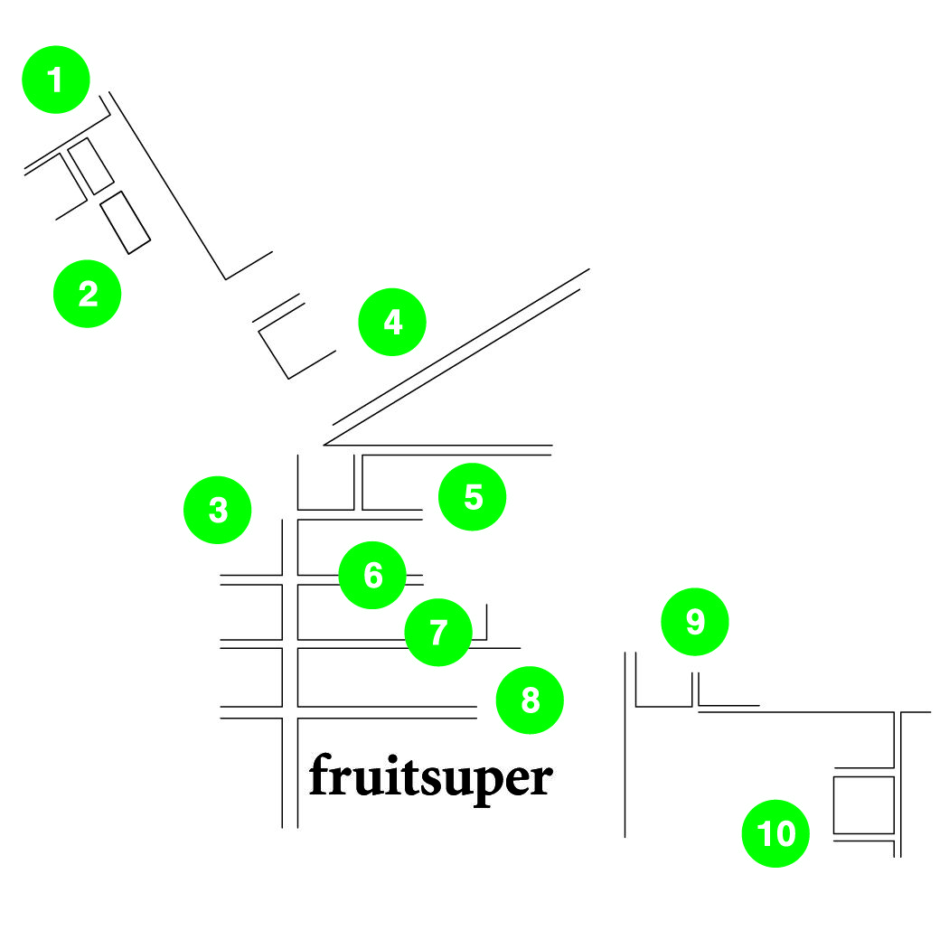 A simplified map with black lines representing streets and buildings, marked by ten green numbered circles. The word 